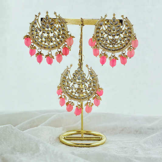Tikka & earring set in pink. High quality beads, pearls and stone work. Latest 2023 fashion for weddings, parties and special occasions