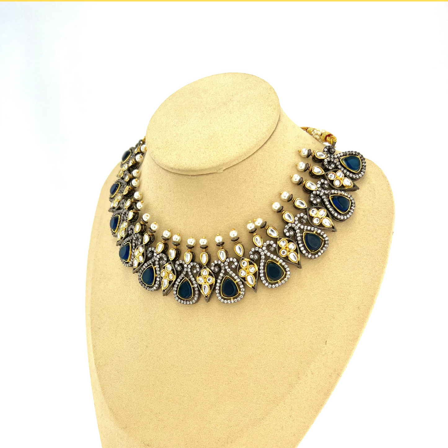 Necklace set with navy blue and clear stone work. Set includes necklace and earrings. Prefect for Indian weddings, parties and special occasions. Latest 2022 fashion. High end Indian fashion jewellery with top quality stones and beads.