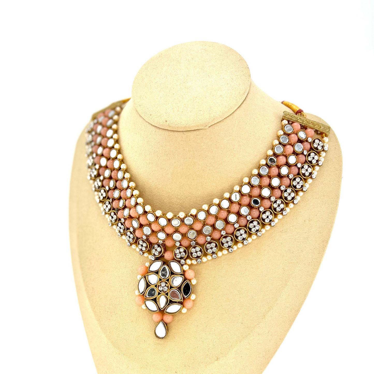 Mirror necklace set with pink beads, clear stones and pearls. Set includes, necklace, tikka and earrings. Prefect for Indian weddings, parties and special occasions. Latest 2022 fashion. High end Indian fashion jewellery with top quality stones and beads.