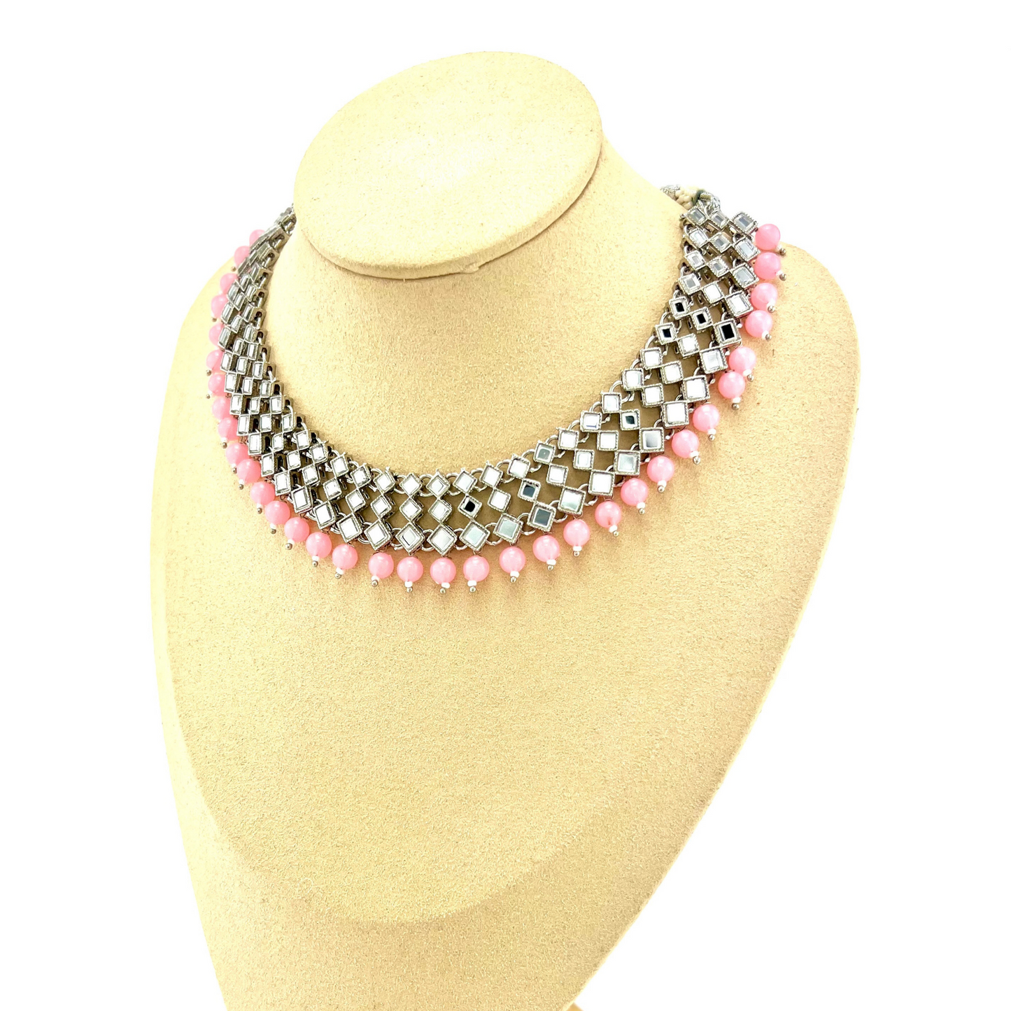 Mirror necklace set with baby pink beads. Set includes, necklace, tikka and earrings. Prefect for Indian weddings, parties and special occasions. Latest 2022 fashion. High end Indian fashion jewellery with top quality stones and beads.