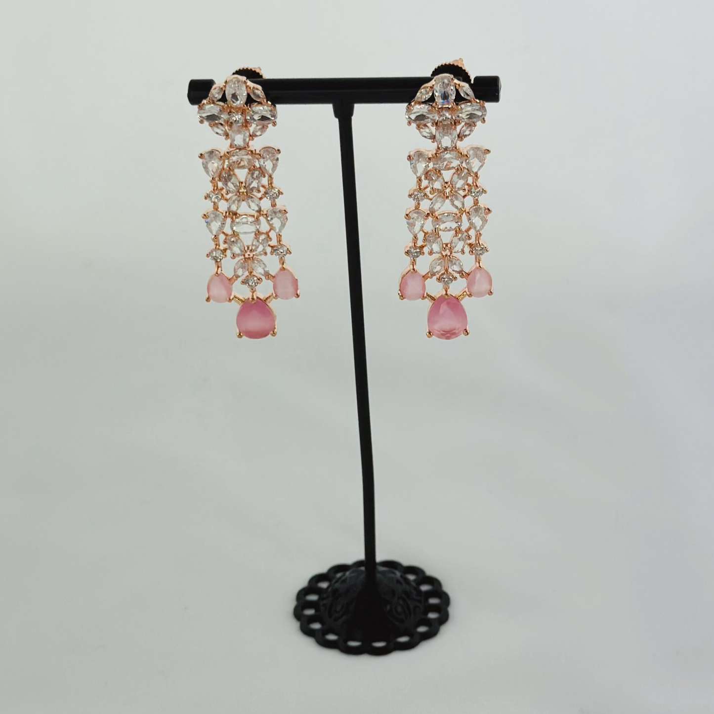 Rosegold necklace set with clear and pink stones. Set includes necklace & earrings. Prefect for Indian weddings, parties and special occasions. Latest 2023 fashion. High end Indian fashion jewellery with top quality stones and beads.