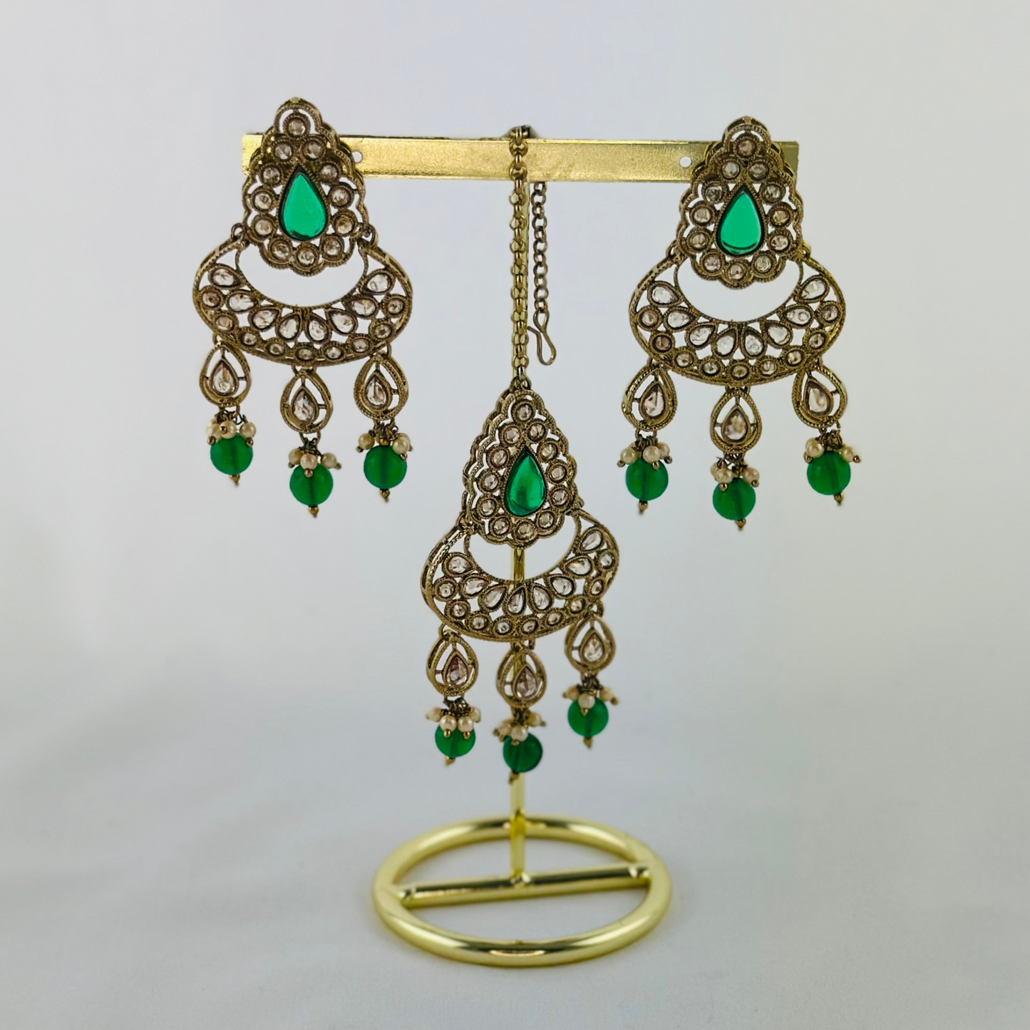 Necklace set with green beads and stone. Set includes necklace, tikka & earrings. Prefect for Indian weddings, parties and special occasions. Latest 2023 fashion. High end Indian fashion jewellery with top quality stones and beads.