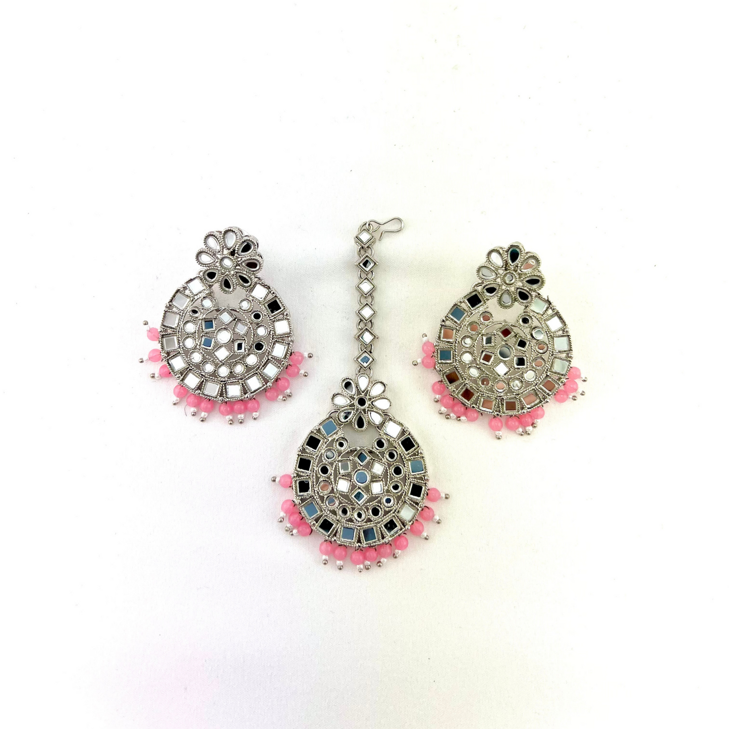 Mirror necklace set with baby pink beads. Set includes, necklace, tikka and earrings. Prefect for Indian weddings, parties and special occasions. Latest 2022 fashion. High end Indian fashion jewellery with top quality stones and beads.