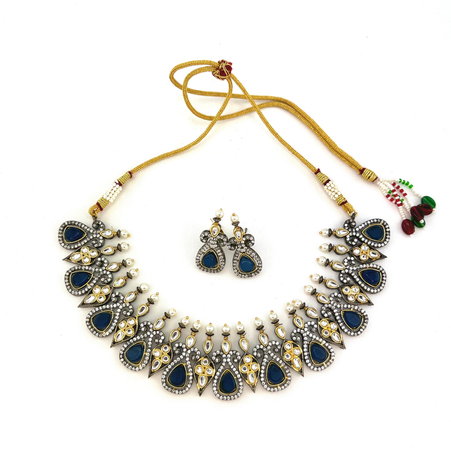 Necklace set with navy blue and clear stone work. Set includes necklace and earrings. Prefect for Indian weddings, parties and special occasions. Latest 2022 fashion. High end Indian fashion jewellery with top quality stones and beads.