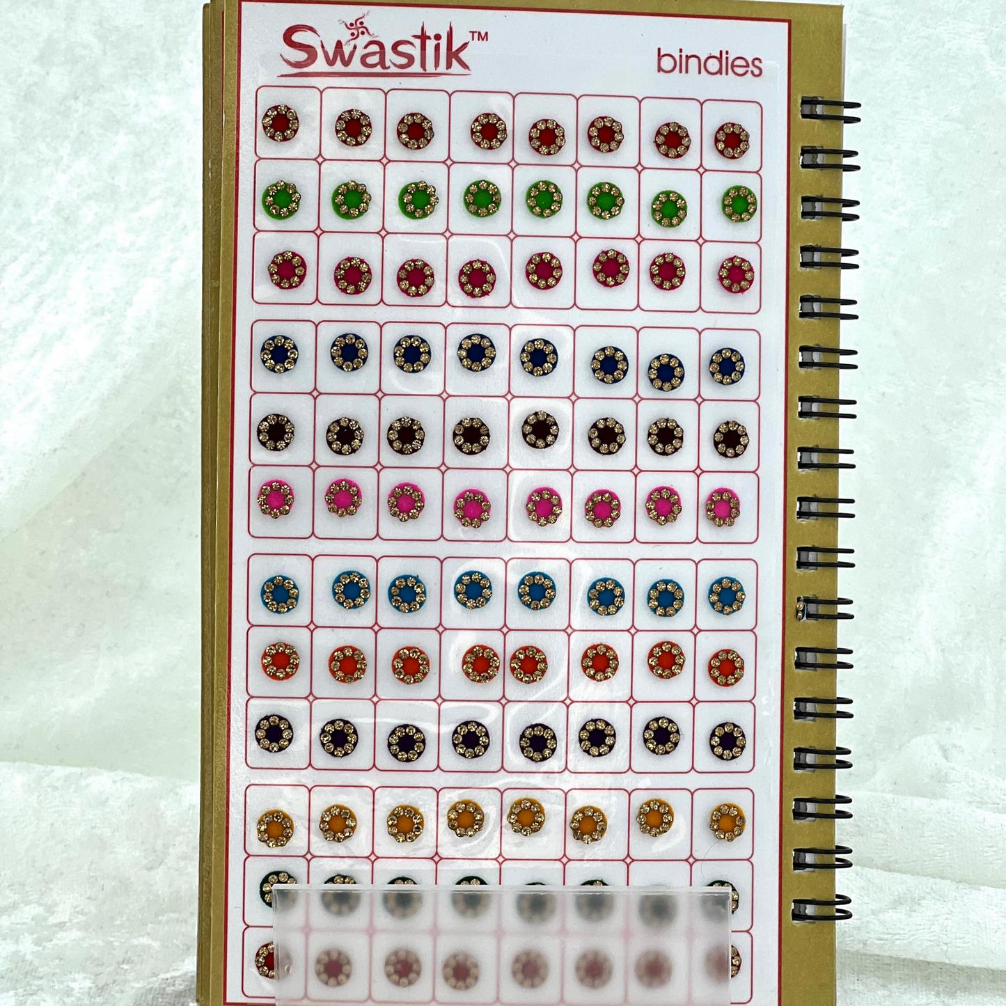 Bindi Book - Gold stone work in round shape in various different sizes and colours. Prefect for Indian weddings, parties and special occasions.