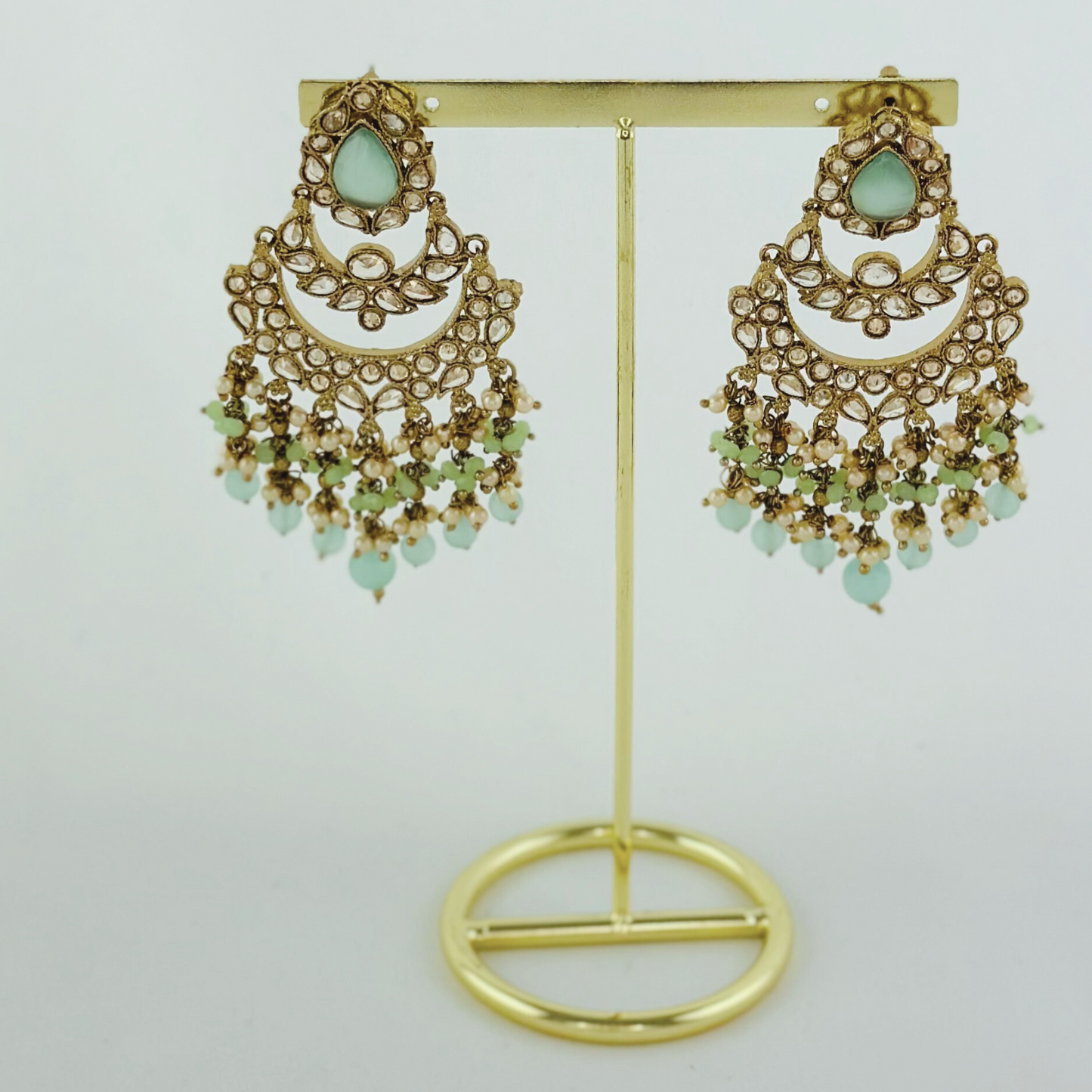 Choker set with aqua blue stones pearl beads. Set includes necklace, tikka & earrings. Prefect for Indian weddings, parties and special occasions. Latest 2023 fashion. High end Indian fashion jewellery with top quality stones and beads.