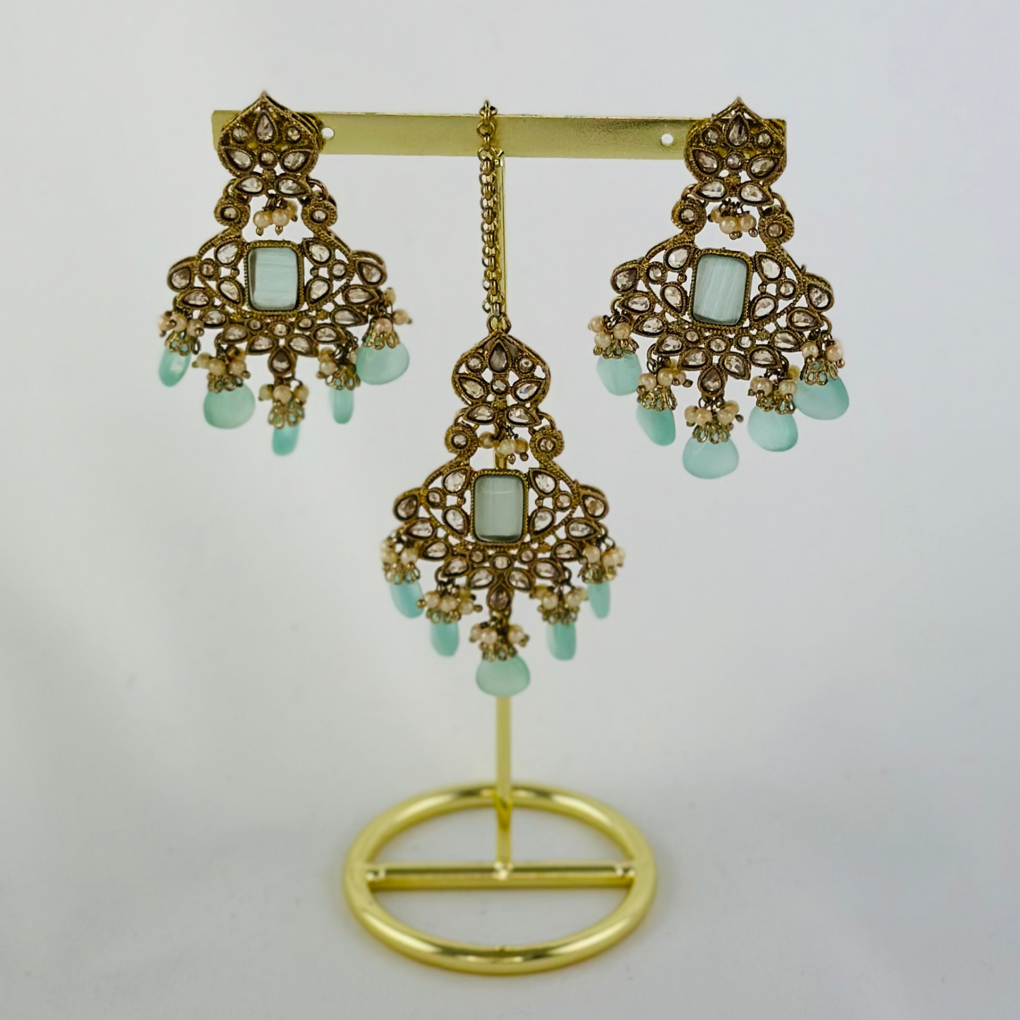 Set includes necklace, tikka & earrings. Prefect for Indian weddings, parties and special occasions. Latest 2023 fashion. High end Indian fashion jewellery with top quality stones and beads.