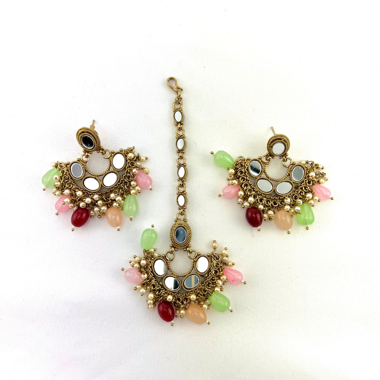 Mirror necklace set with multi colour beads and small white pearls. Set includes necklace, tikka and earrings. Prefect for Indian parties, weddings and special occasions. Latest 2022 fashion.