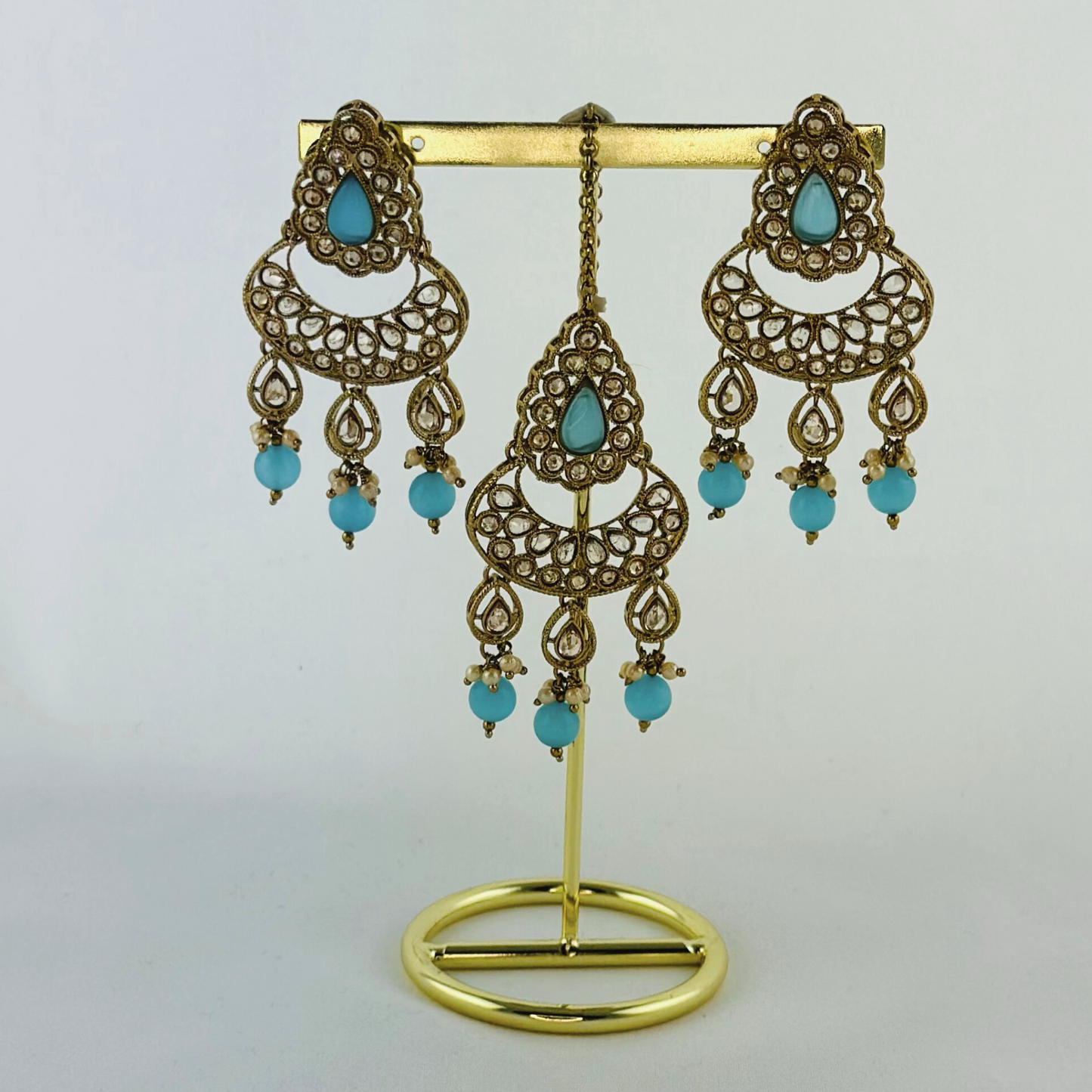 Necklace set with blue stones and beads. Set includes necklace, tikka & earrings. Prefect for Indian weddings, parties and special occasions. Latest 2023 fashion. High end Indian fashion jewellery with top quality stones and beads.