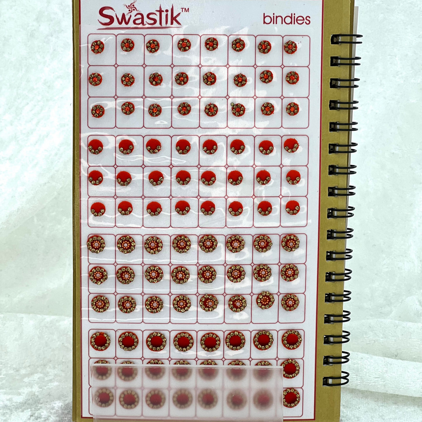 Bindi Book - Gold stone work in round shape in various different sizes and colours. Prefect for Indian weddings, parties and special occasions.
