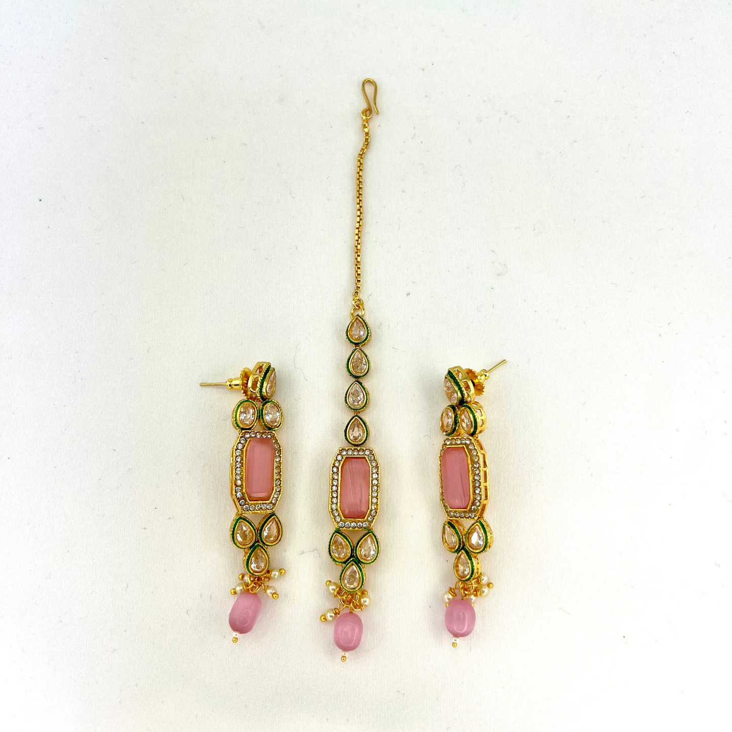 Necklace set with pink beads and clear and pink stones. Set includes necklace, tikka and earrings. Prefect for Indian weddings, parties and special occasions. Latest 2022 fashion. High end Indian fashion jewellery with top quality stones and beads.
