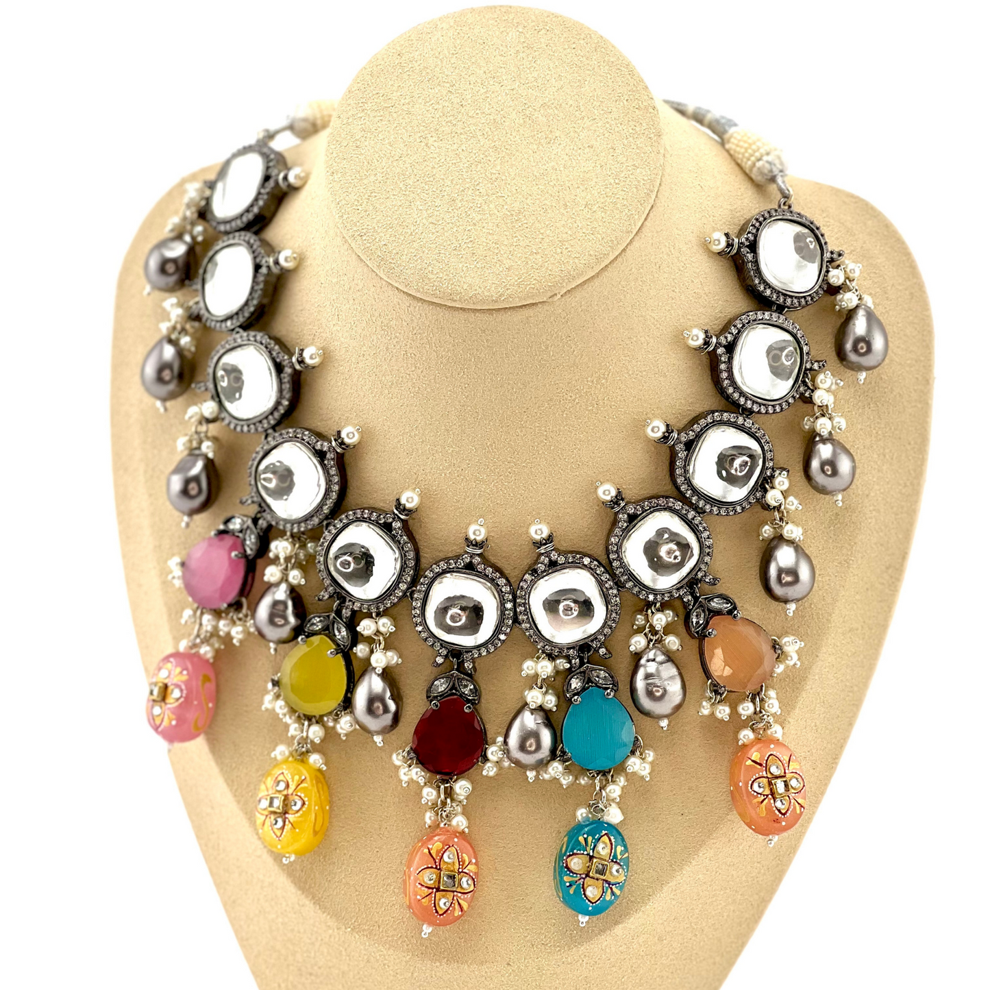 Kundan necklace set with multi colour stones and beads. Set includes necklace, tikka and earrings. Prefect for Indian parties, weddings and special occasions. Latest 2022 fashion