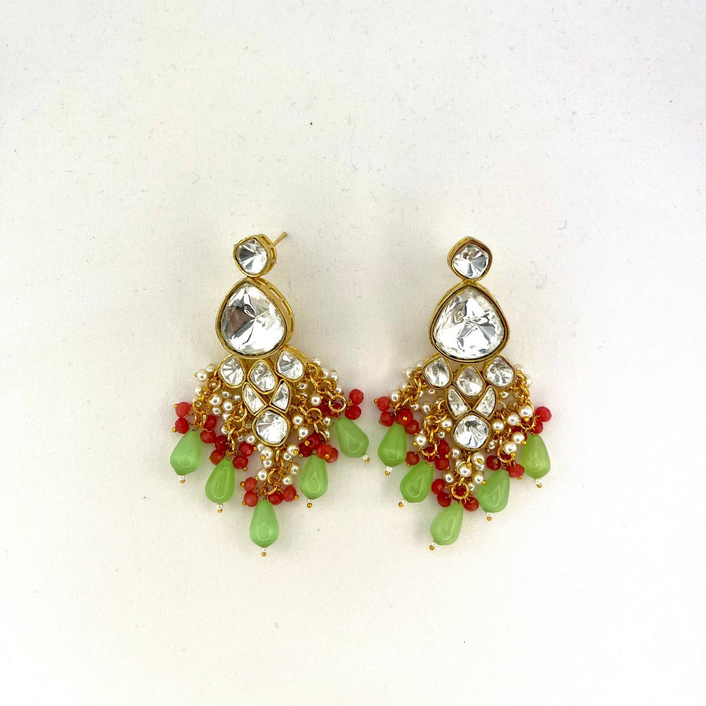 Kundan necklace set with with clear stones, green and pink beads. Set includes necklace and earrings. Prefect for Indian weddings, parties and special occasions. Latest 2022 fashion. High end Indian fashion jewellery with top quality stones and beads.