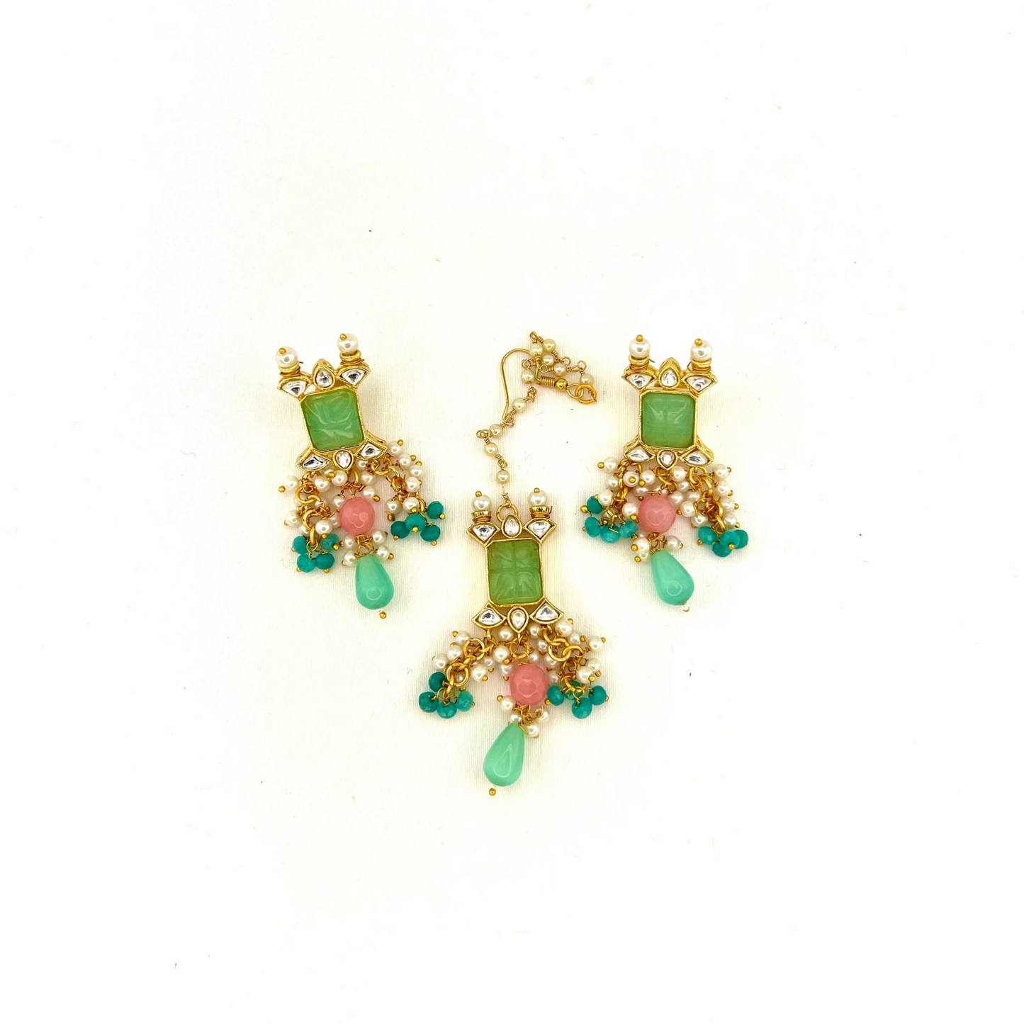 Choker set with with green, clear stones and pink and blue beads. Set includes choker, tikka and earrings. Prefect for Indian weddings, parties and special occasions. Latest 2022 fashion. High end Indian fashion jewellery with top quality stones and beads..