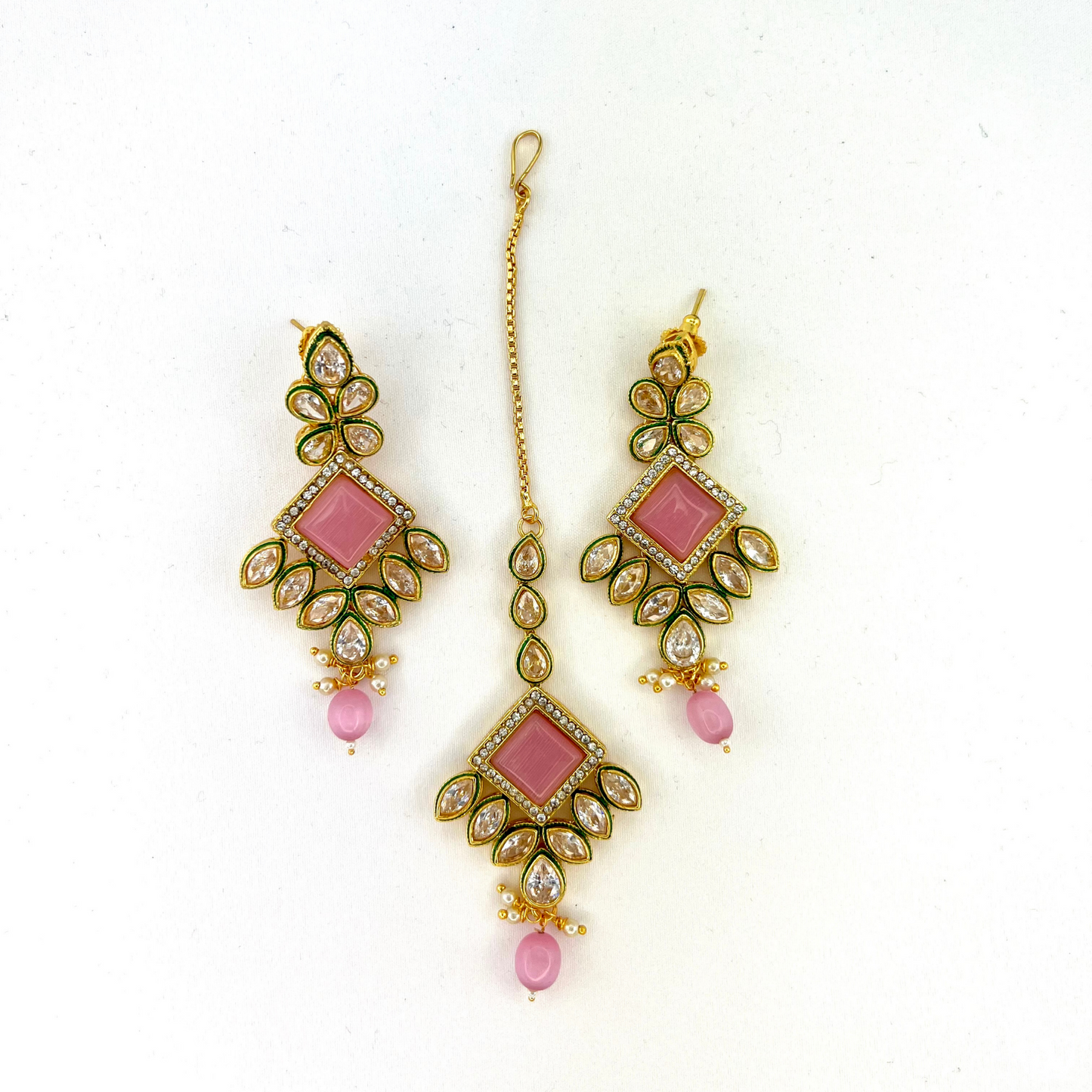 Necklace set with pink beads and pink and clear stone. Set includes necklace, tikka & earrings. Prefect for Indian weddings, parties and special occasions. Latest 2022 fashion. High end Indian fashion jewellery with top quality stones and beads.
