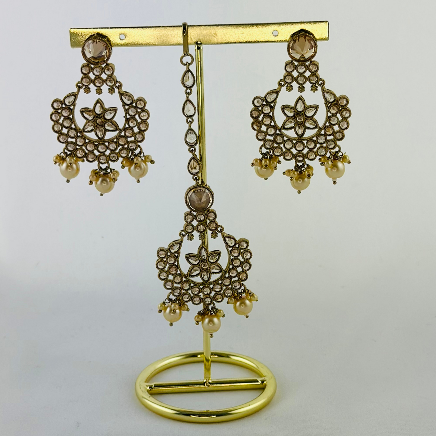 Necklace set with white pearl beads. Set includes necklace, tikka & earrings. Prefect for Indian weddings, parties and special occasions. Latest 2023 fashion. High end Indian fashion jewellery with top quality stones and beads.