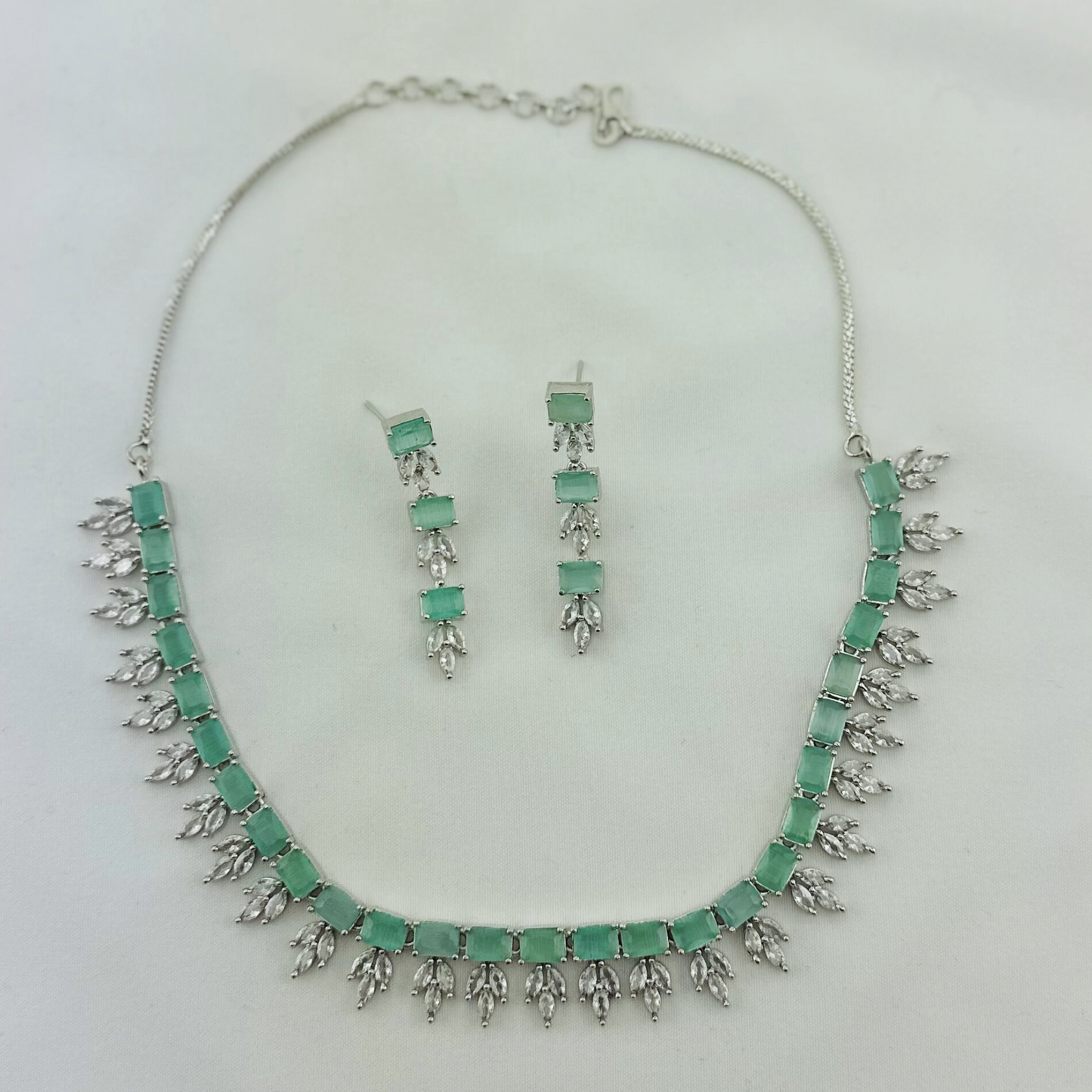 Necklace set with light blue and clear stones. Set includes necklace & earrings. Prefect for Indian weddings, parties and special occasions. Latest 2023 fashion. High end Indian fashion jewellery with top quality stones and beads.
