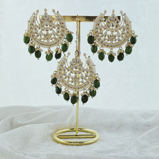 Tikka & earring set in forest green. High quality beads, pearls and stone work. Latest 2023 fashion for weddings, parties and special occasions