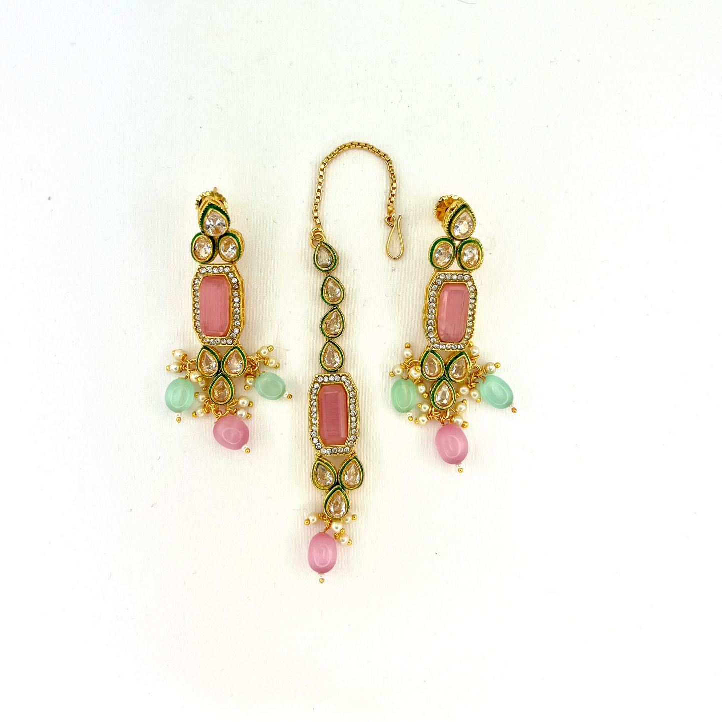 Necklace set with green, pink and clear stones and green and pink beads. Set includes necklace, tikka and earrings. Prefect for Indian weddings, parties and special occasions. Latest 2022 fashion. High end Indian fashion jewellery with top quality stones and beads.