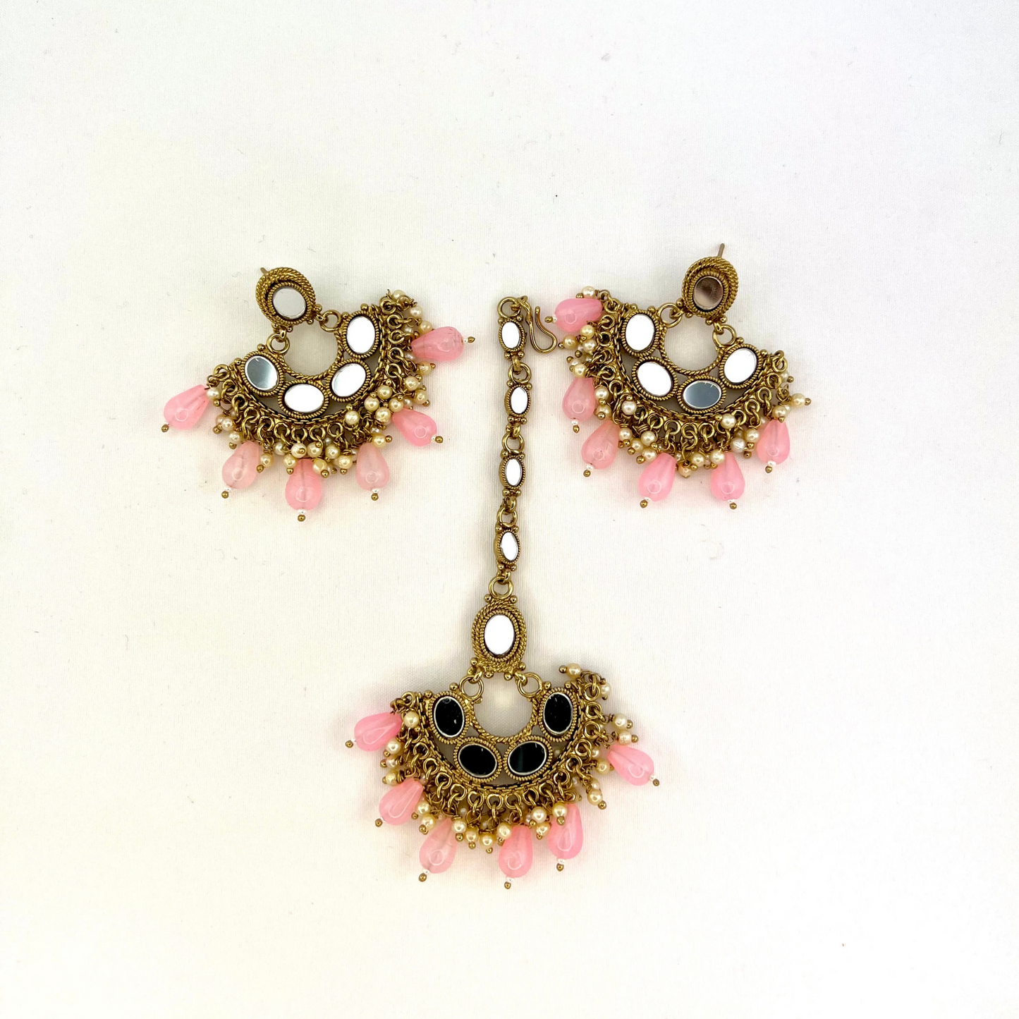 Mirror necklace set with pink beads and small white pearls. Set includes necklace, tikka and earrings. Prefect for Indian parties, weddings and special occasions. Latest 2022 fashion.