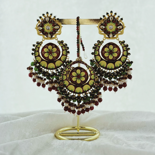 Hand painted tikka & earring set in green, red & white. High quality beads, pearls and stone work. Latest 2023 fashion for weddings, parties and special occasions