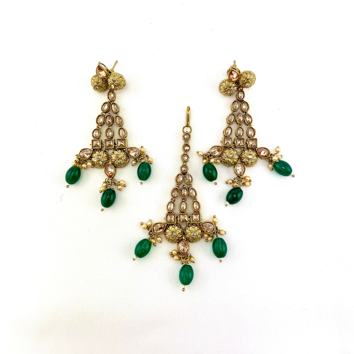 Necklace set with green beads and gold stone work. Set includes necklace, tikka and earrings. Prefect for Indian weddings, parties and special occasions. Latest 2022 fashion. High end Indian fashion jewellery with top quality stones and beads.