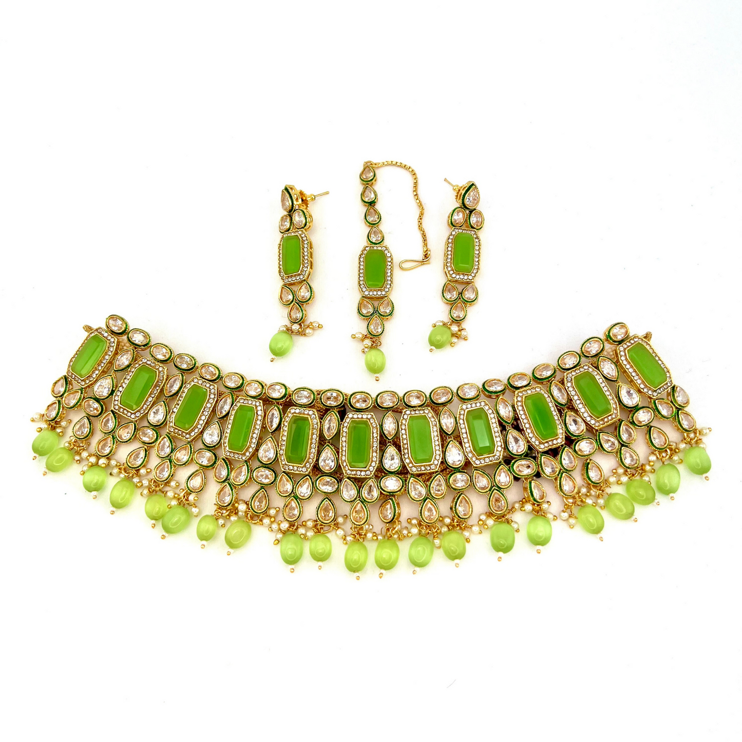 Necklace set with mint green beads and clear and mint green stones. Set includes necklace, tikka and earrings. Prefect for Indian weddings, parties and special occasions. Latest 2022 fashion. High end Indian fashion jewellery with top quality stones and beads.