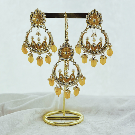 Tikka & Earring Set in yellow. High quality beads, pearls and stone work. Latest 2023 fashion for weddings, parties and special occasions