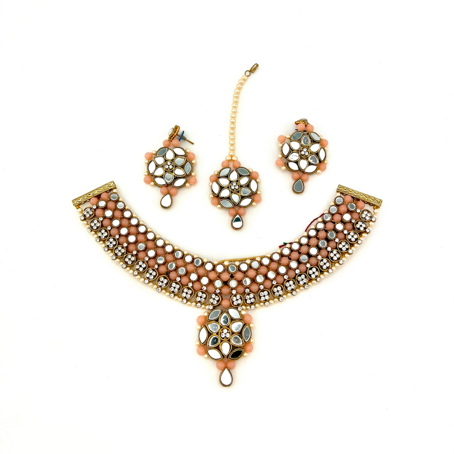 Mirror necklace set with pink beads, clear stones and pearls. Set includes, necklace, tikka and earrings. Prefect for Indian weddings, parties and special occasions. Latest 2022 fashion. High end Indian fashion jewellery with top quality stones and beads.