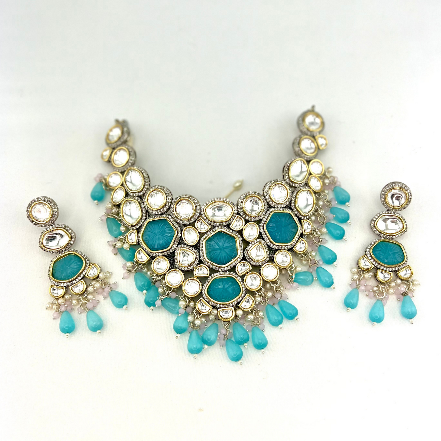 Kundan necklace set with with clear and blue stones, blue beads and small white pearls. Set includes necklace and earrings. Prefect for Indian weddings, parties and special occasions. Latest 2022 fashion. High end Indian fashion jewellery with top quality stones and beads.