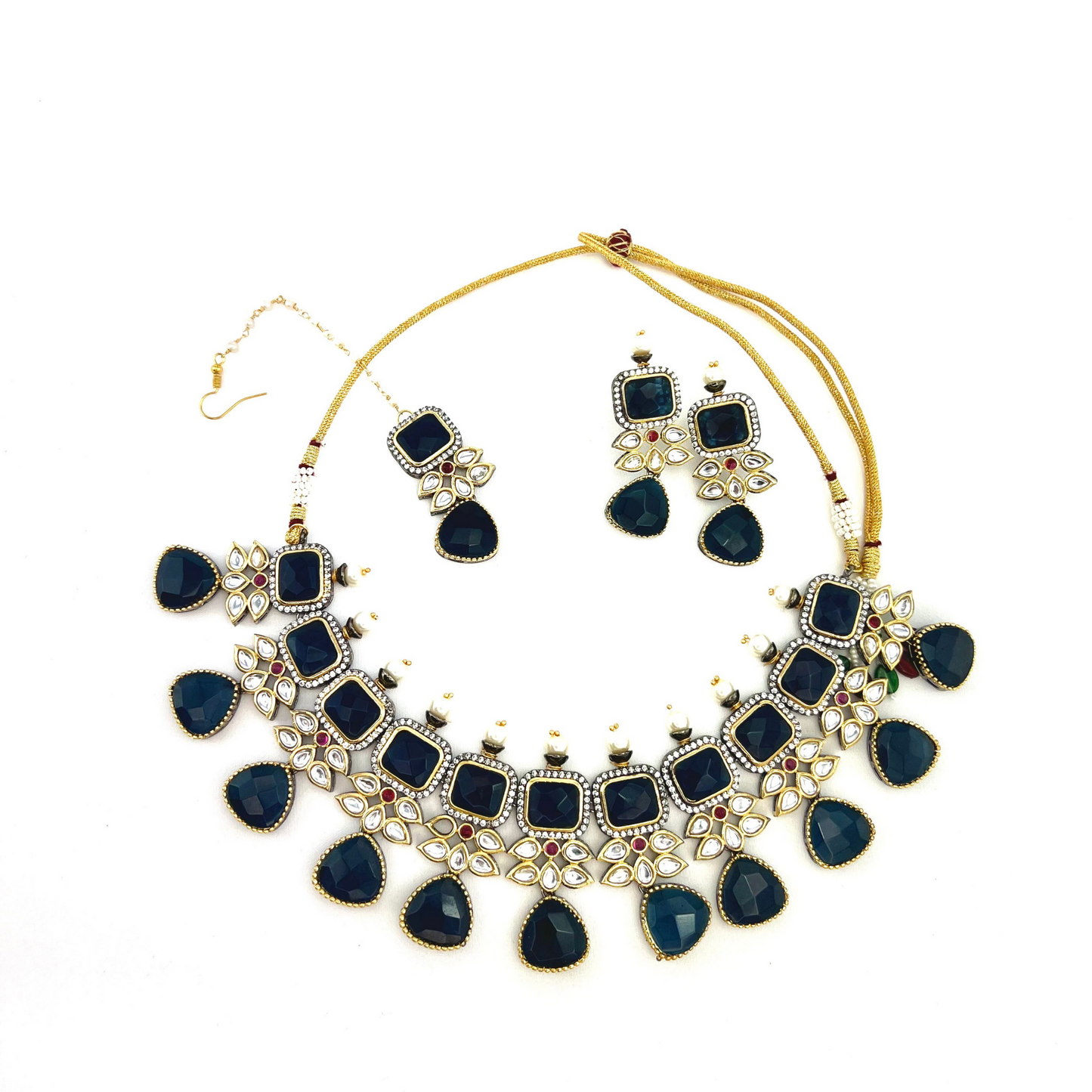 Necklace set with Navy and silver stone work finished with small white pearls. Set includes necklace, tikka and earrings. Prefect for Indian parties, weddings and special occasions. Latest 2022 fashion
