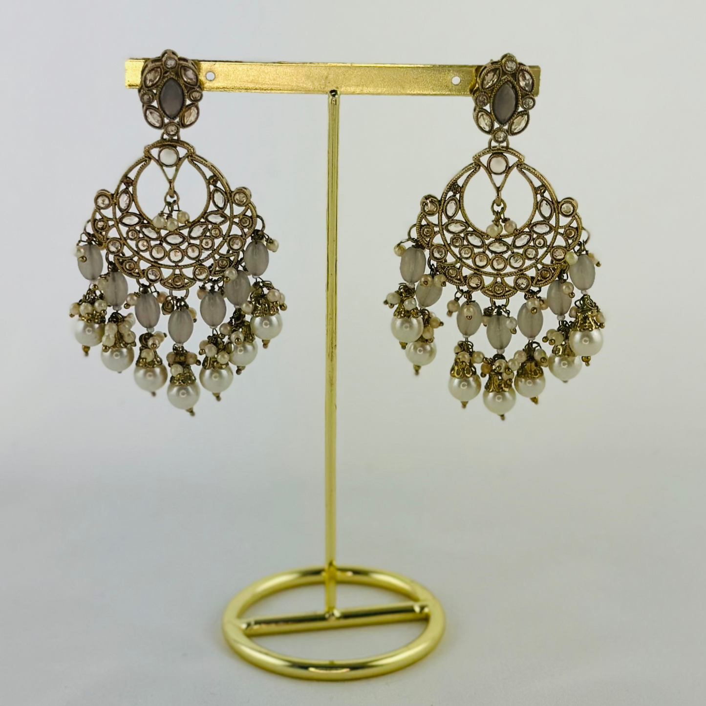 Necklace set with grey stones and white pearl beads. Set includes necklace, tikka & earrings. Prefect for Indian weddings, parties and special occasions. Latest 2023 fashion. High end Indian fashion jewellery with top quality stones and beads.