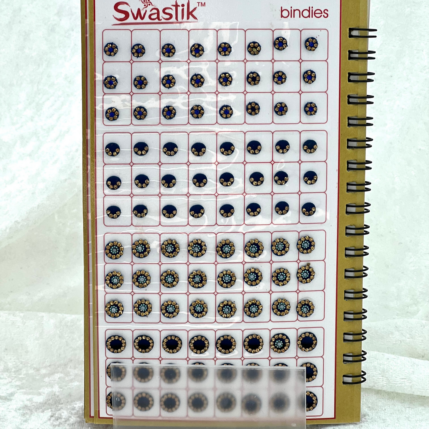 Bindi Book - Gold stone work in round shape in various different sizes and colours. Prefect for Indian weddings, parties and special occasions.