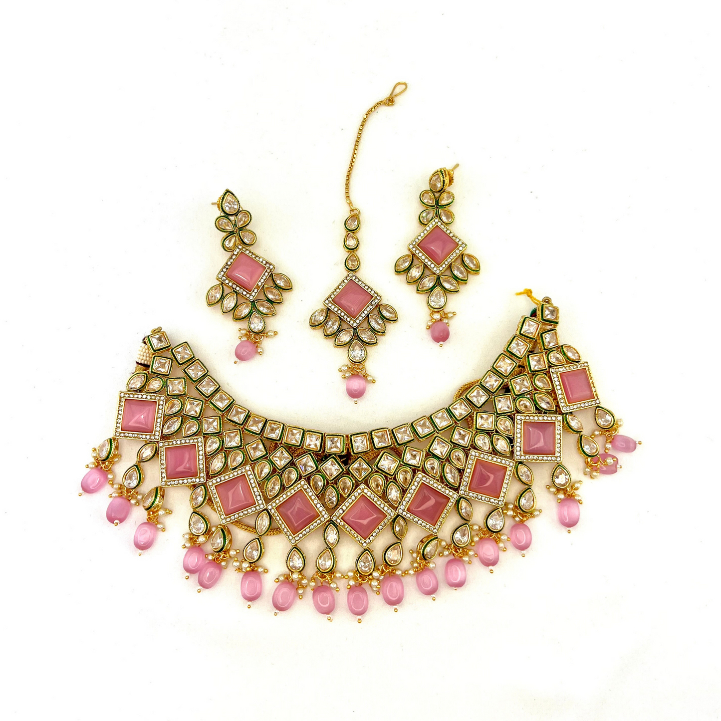 Necklace set with pink beads and pink and clear stone. Set includes necklace, tikka & earrings. Prefect for Indian weddings, parties and special occasions. Latest 2022 fashion. High end Indian fashion jewellery with top quality stones and beads.
