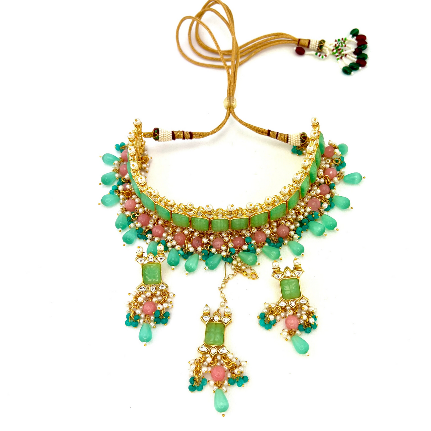 Choker set with with green, clear stones and pink and blue beads. Set includes choker, tikka and earrings. Prefect for Indian weddings, parties and special occasions. Latest 2022 fashion. High end Indian fashion jewellery with top quality stones and beads.