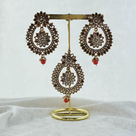 Tikka & earring set in pink. High quality beads, pearls and stone work. Latest 2023 fashion for weddings, parties and special occasions