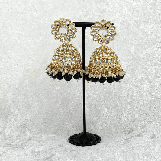 Jhumka earrings in black with stones, pearls and beads. Indian wedding jewellery prefect for weddings, parties and special occasions. latest high quality 2022 fashion