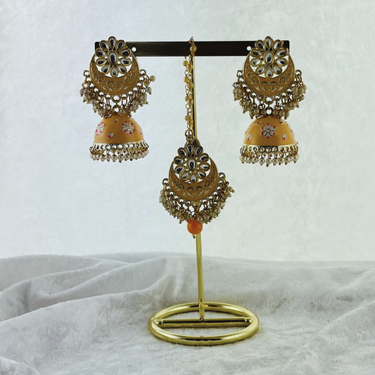 Tikka & Earring Set in peach. High quality beads, pearls and stone work. Latest 2023 fashion for weddings, parties and special occasions