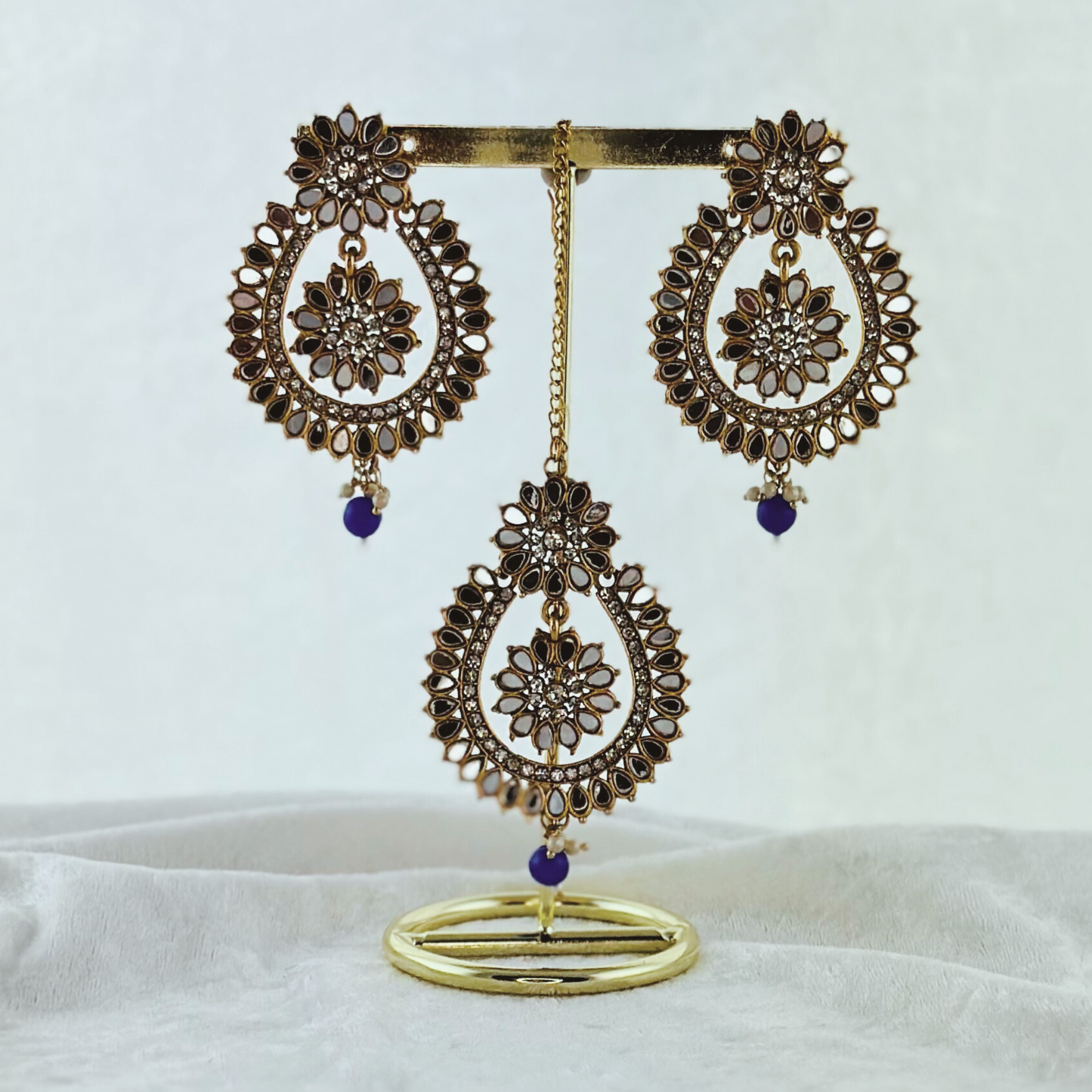 Tikka & earring set in blue. High quality beads, pearls and stone work. Latest 2023 fashion for weddings, parties and special occasions