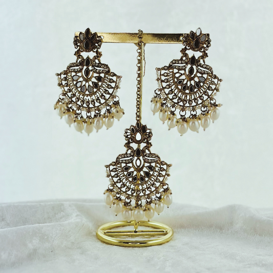 Tikka & earring set in white pearl. High quality beads, pearls and stone work. Latest 2023 fashion for weddings, parties and special occasions