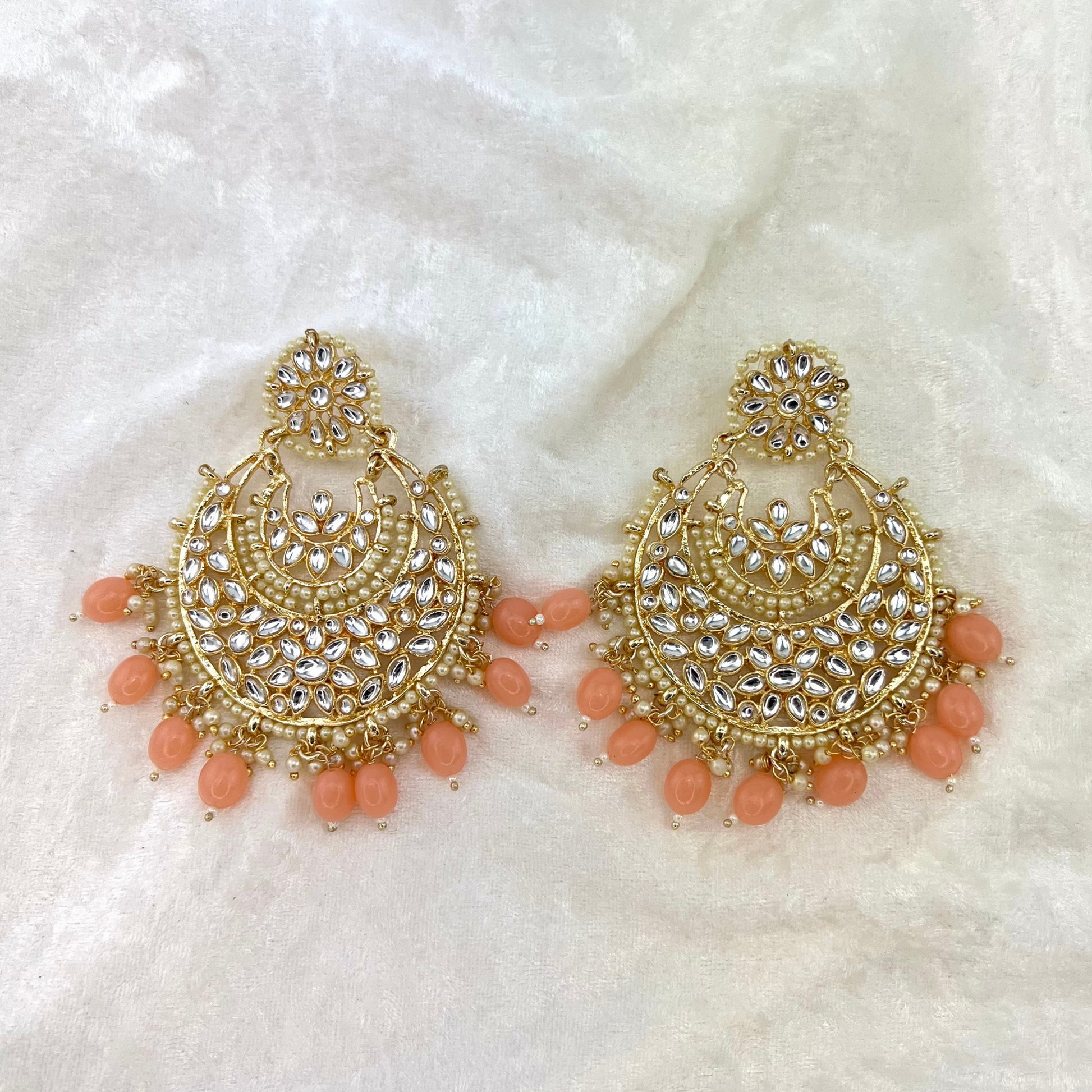Indian wedding jewellery - large earrinfs with high quality stones and beads in peach