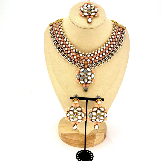 Mirror necklace set with pink beads, clear stones and pearls.  Set includes, necklace, tikka and earrings.  Prefect for Indian weddings, parties and special occasions.  Latest 2022 fashion. High end Indian fashion jewellery with top quality stones and beads.