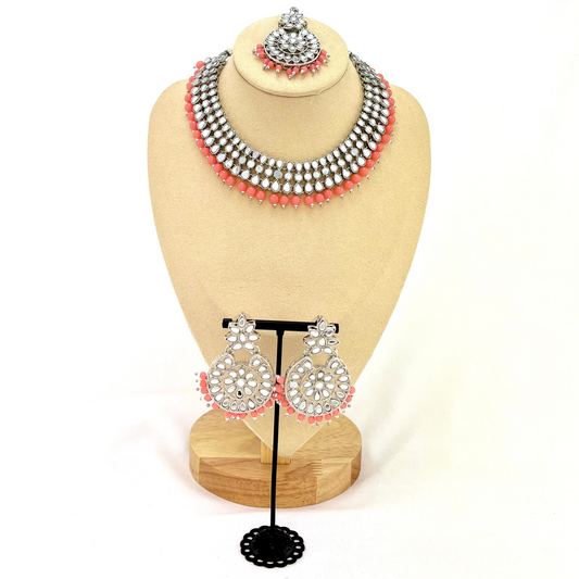 ﻿Mirror necklace set with pink beads.  Set includes, necklace, tikka and earrings.  Prefect for Indian weddings, parties and special occasions.  Latest 2022 fashion. High end Indian fashion jewellery with top quality stones and beads.