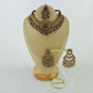 Choker set with bronze stones and white pearl beads.  Set includes necklace, tikka & earrings.  Prefect for Indian weddings, parties and special occasions.   Latest 2023 fashion. High end Indian fashion jewellery with top quality stones and beads.