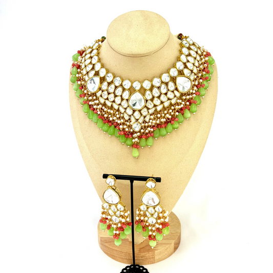 Kundan necklace set with with clear stones, green and pink beads.  Set includes necklace and earrings.  Prefect for Indian weddings, parties and special occasions.  Latest 2022 fashion. High end Indian fashion jewellery with top quality stones and beads.