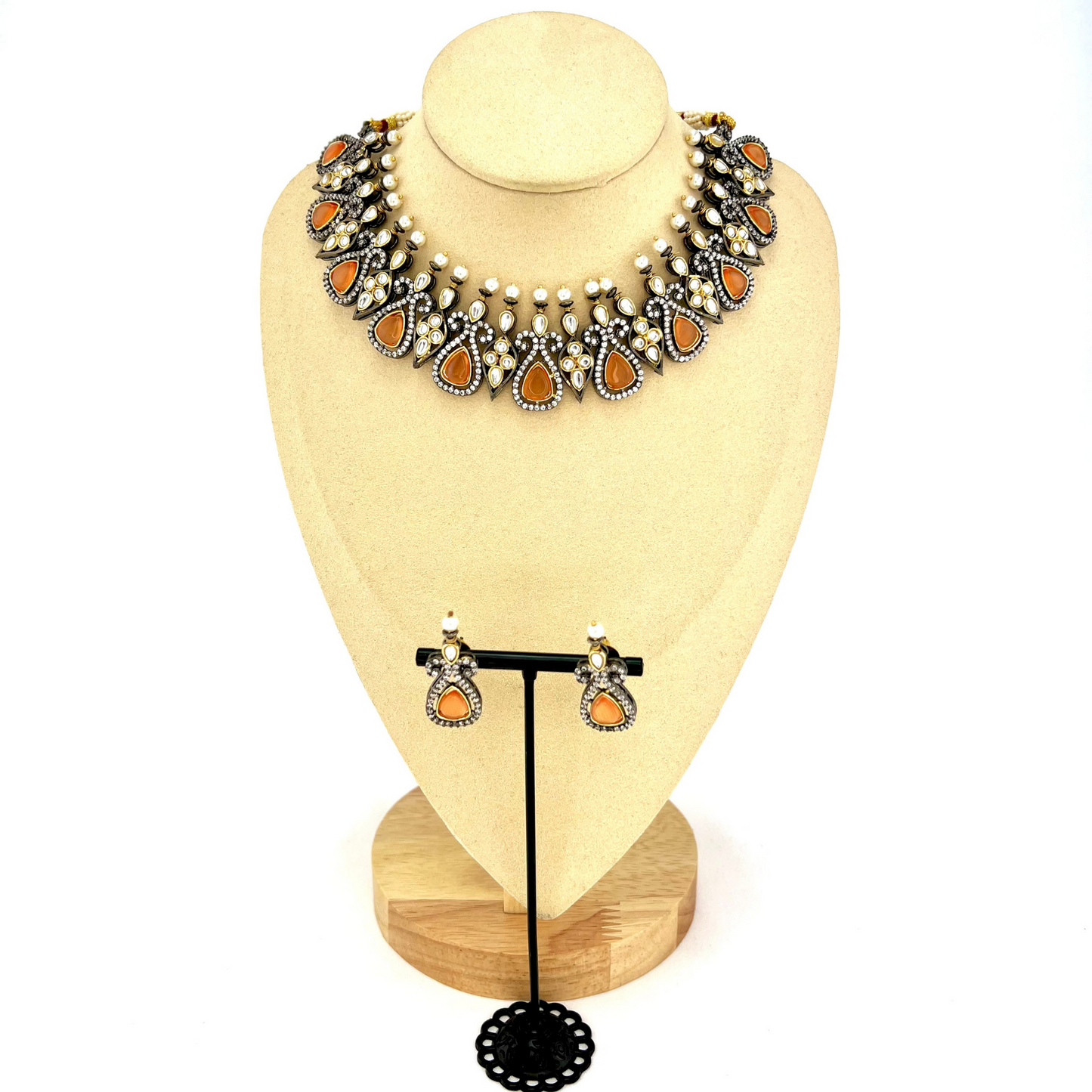 Necklace set with peach and clear stone work.  Set includes necklace and earrings.  Prefect for Indian weddings, parties and special occasions.  Latest 2022 fashion. High end Indian fashion jewellery with top quality stones and beads.