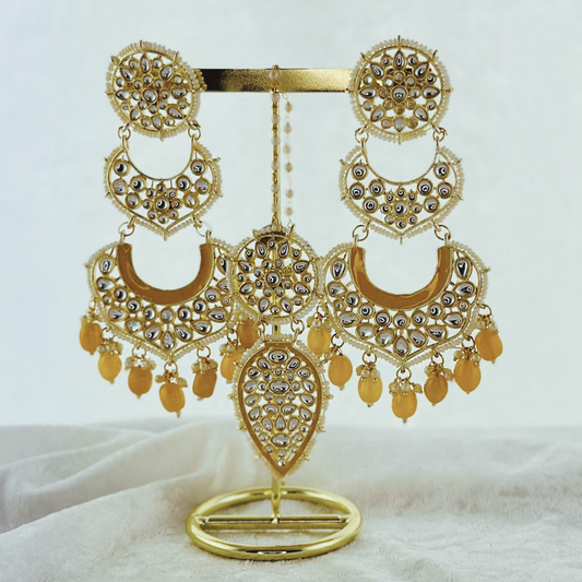 Tikka & Earring Set in yellow.  High quality beads, pearls and stone work.   Latest 2023 fashion for weddings, parties and special occasions 