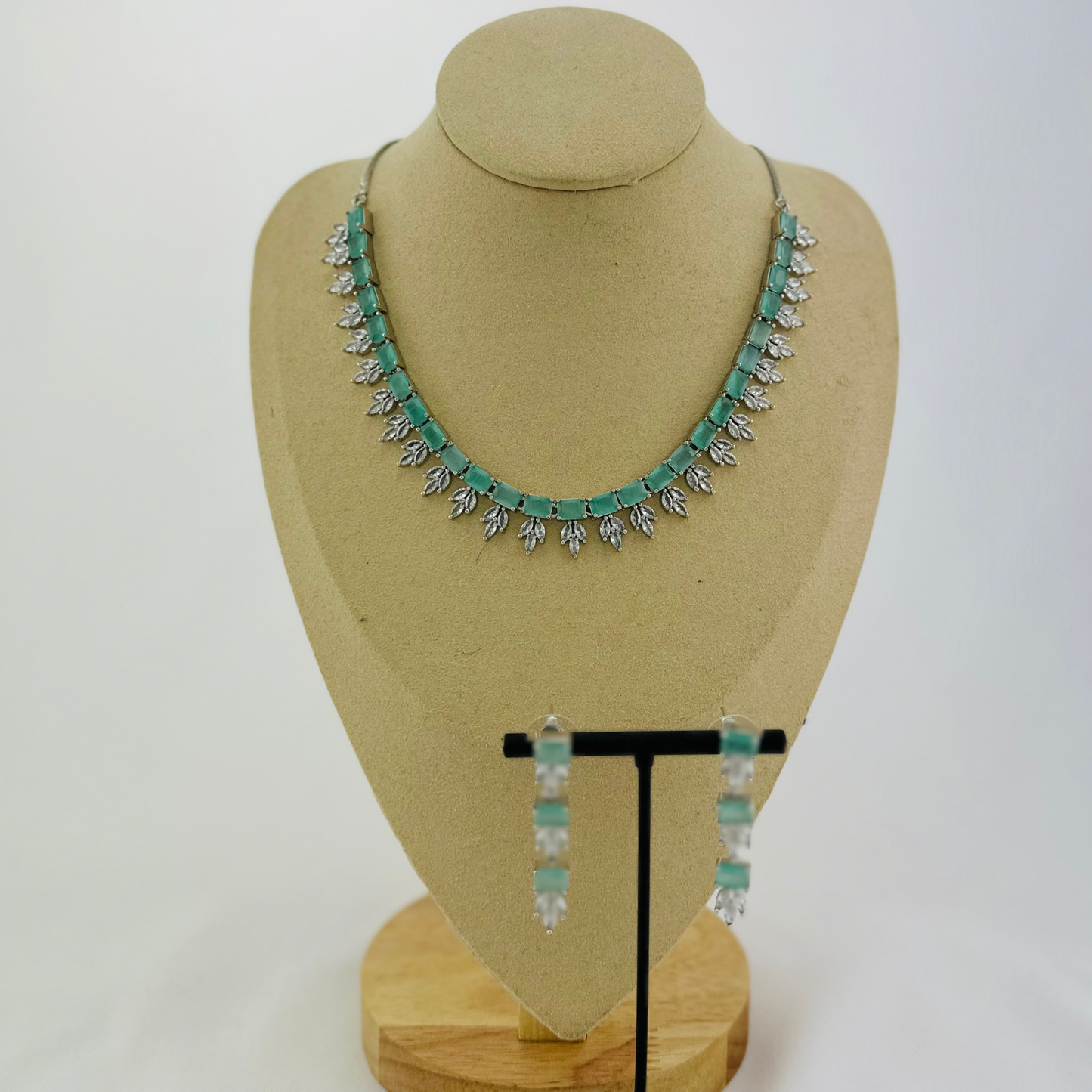 Necklace set with light blue and clear stones.  Set includes necklace & earrings.  Prefect for Indian weddings, parties and special occasions.   Latest 2023 fashion. High end Indian fashion jewellery with top quality stones and beads.