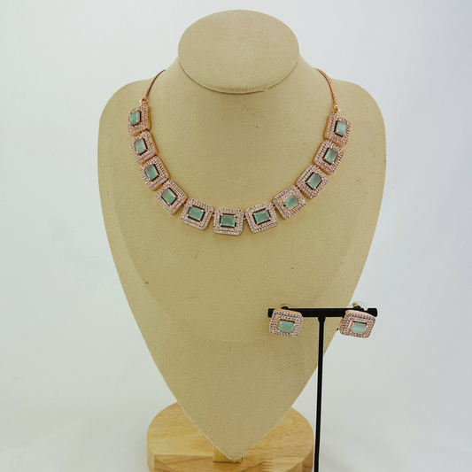 Rosegold necklace set with light blue and clear stones.  Set includes necklace & earrings.  Prefect for Indian weddings, parties and special occasions.   Latest 2023 fashion. High end Indian fashion jewellery with top quality stones and beads.