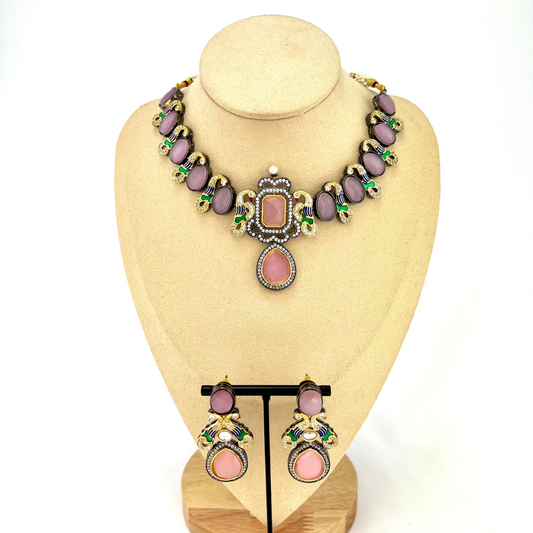 Necklace set with pink and purple clear stone work.  Set includes necklace and earrings.  Prefect for Indian weddings, parties and special occasions.  Latest 2022 fashion. High end Indian fashion jewellery with top quality stones and beads.